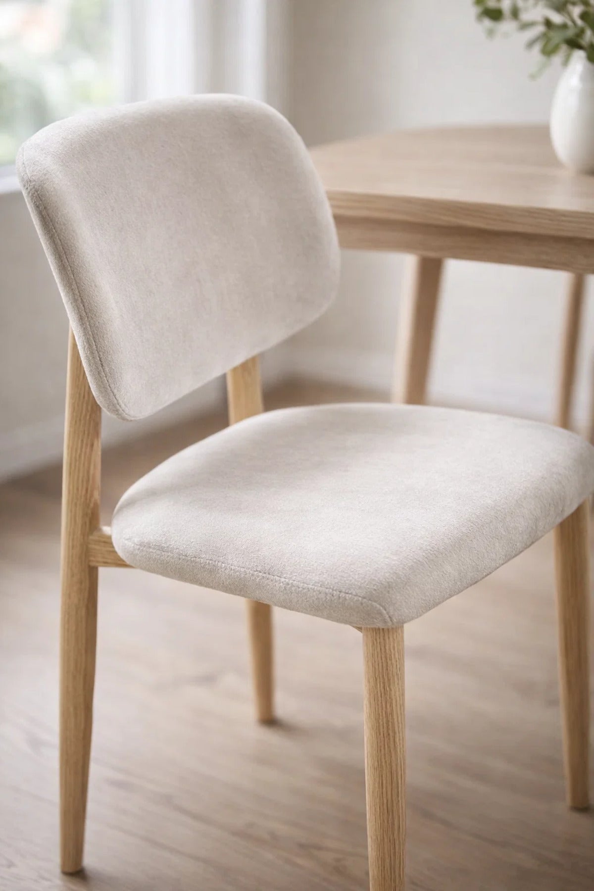 Elegant White Dining Chair with Comfortable Upholstery and Wooden Legs elegant white