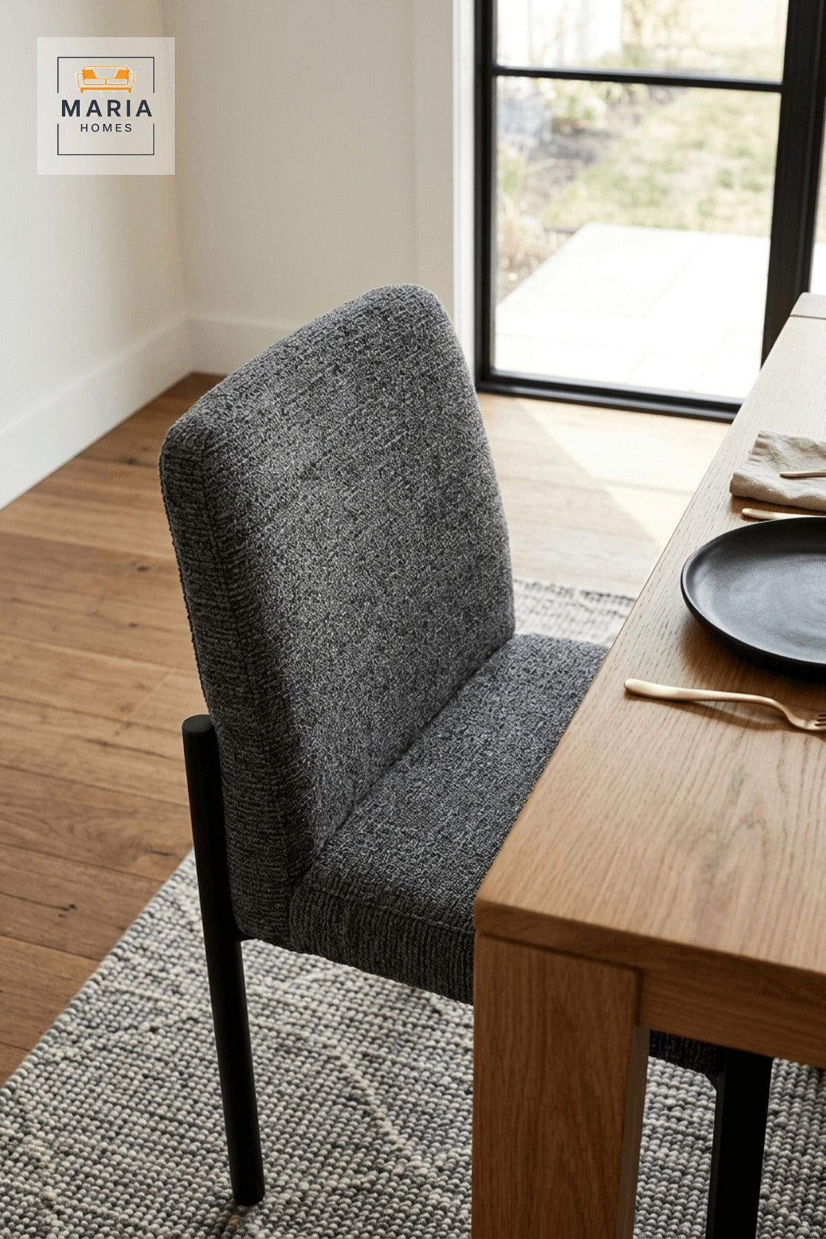 Gray Upholstered Dining Chair with Black Legs for Modern Home Dining Spaces